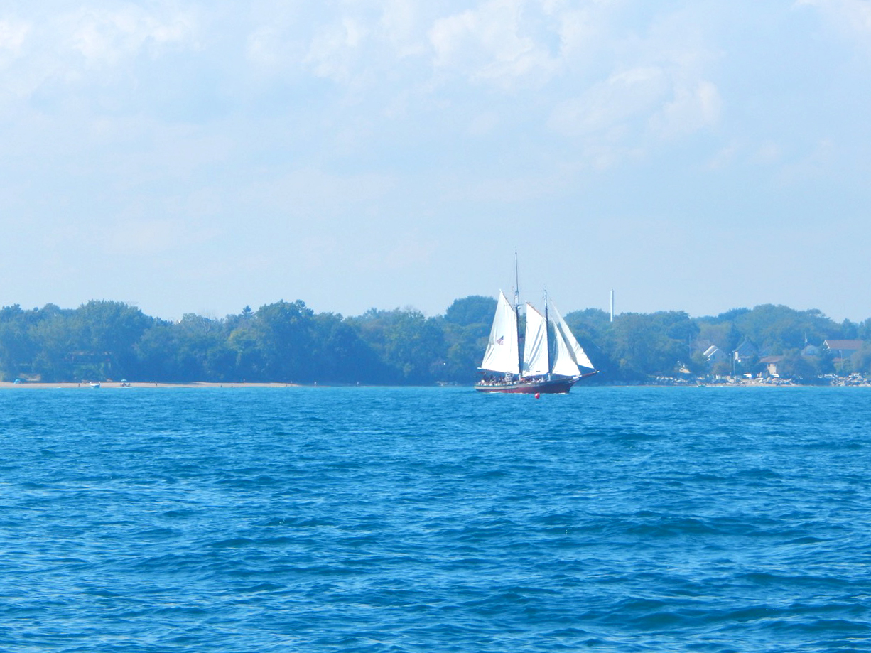 Lanteen-rigged sailboat on Lake Michicgan